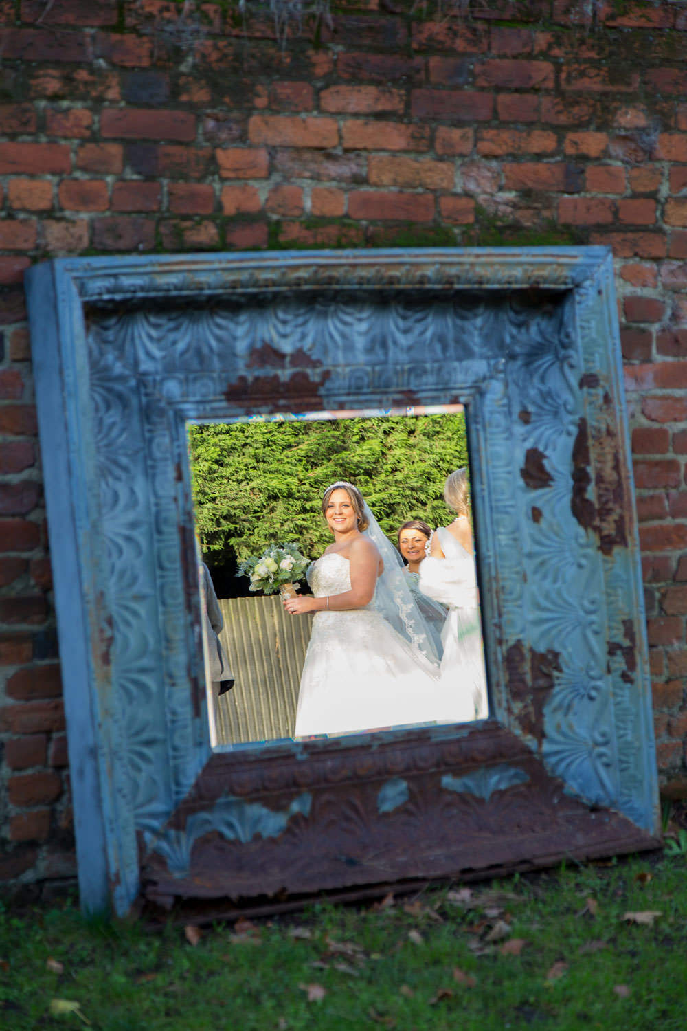 Bride in the mirror at Gaynes Park